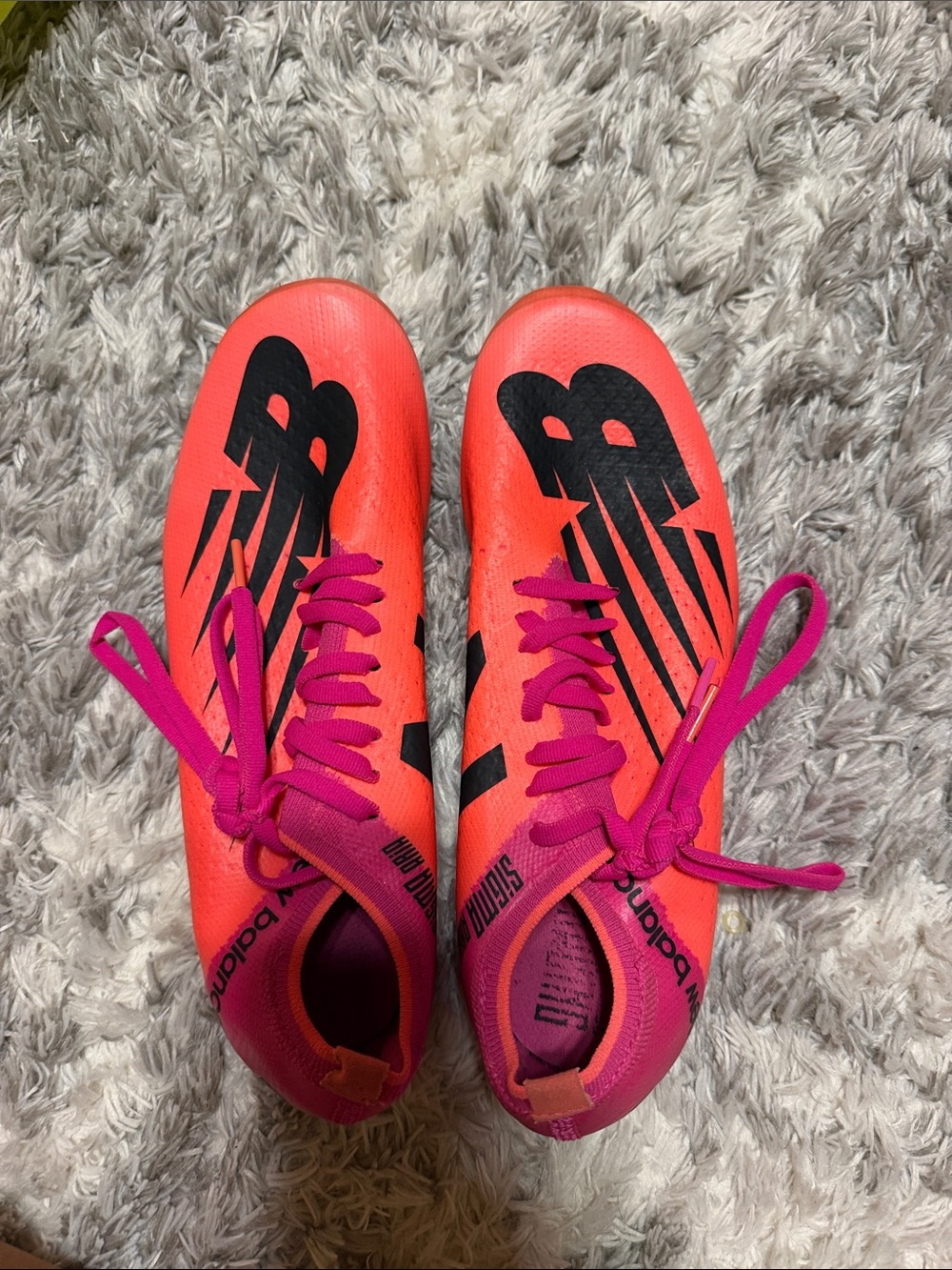 Pink and Orange NewBalance Track Spikes